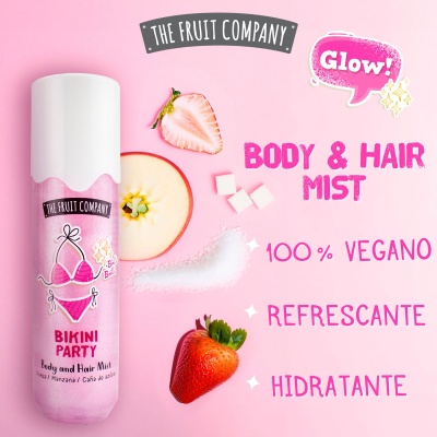 Frasco rosa de Body and Hair Mist com frutas e texto sobre fundo rosa