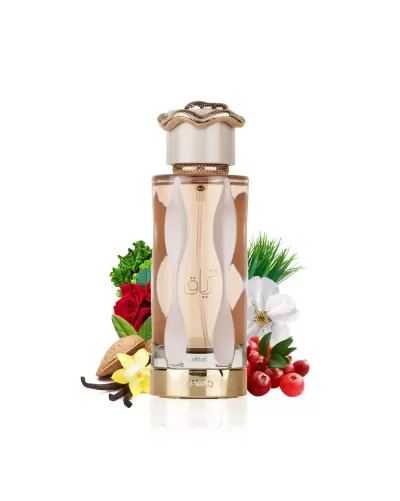 Frasco de perfume com tampa dourada e decorativa rodeado por flores e frutos.