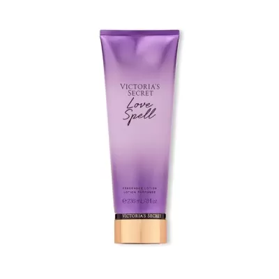 Embalaem roxa degradê e tampa dourada da loção Victorias Secret Love Spell