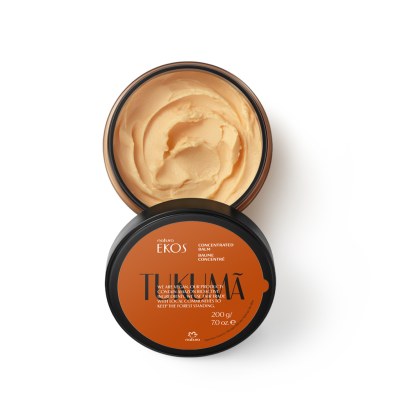 Frasco aberto de creme corporal Natura Ekos com tampa preta e rótulo laranja