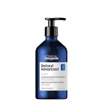Frasco azul de champô Profissional Serioxyl Advanced da L'Oréal com tampa de bomba