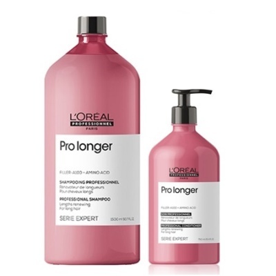 Dois frascos de champô cor de rosa L'OREAL Pro longer com rótulo branco