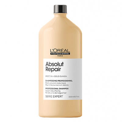 Frasco de champô L'Oréal Absolut Repair bege com etiqueta branca.