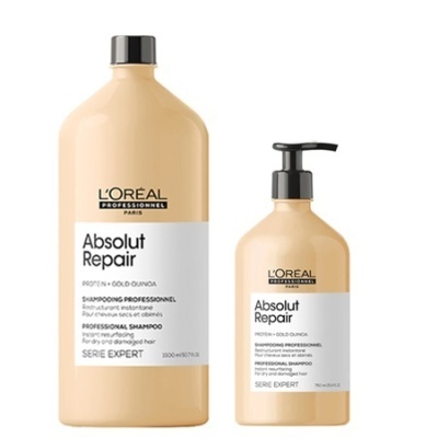 Dois frascos de champô L'Oréal Absolut Repair bege com rótulos brancos e texto preto