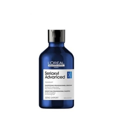 Frasco de champô L'OREAL Serioxyl Advanced azul com rótulo branco