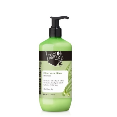 Frasco verde claro de shampoo com tampa preta e etiqueta branca e preta