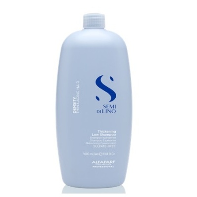 Frasco azul claro de champô Semi Di Lino com texto azul e branco