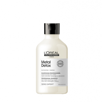 Frasco branco com tampa preta de shampoo L'Oréal Metal Detox, texto preto e selo cinza.