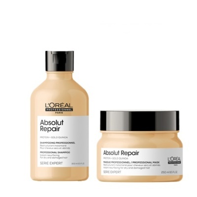 Produtos L'Oréal Absolut Repair champô e máscara bege com tampas pretas