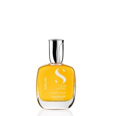 Frasco de óleo capilar amarelo em vidro com tampa prateada