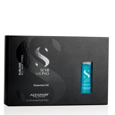 Caixa preta de óleo essencial 'Semi Di Lino' com frasco azul visível