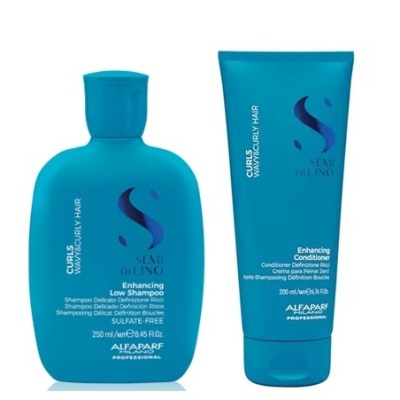 Frascos azuis de shampoo e condicionador Semi di Lino Enhancing da Alfaparf Milano