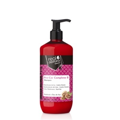 Frasco vermelho com shampoo Real Natura Pro-Cor Complexo B com tampa preta e rótulo rosa e preto