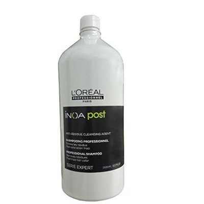Frasco de shampoo profissional L'Oréal INOA post com rótulo preto e verde