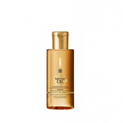 Frasco dourado de champô Mythic Oil com texto castanho
