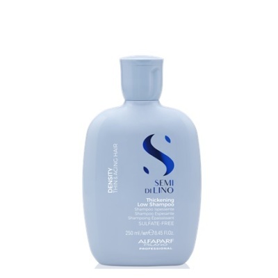 Frasco azul claro de champô Thickening Low Shampoo da Alfaparf
