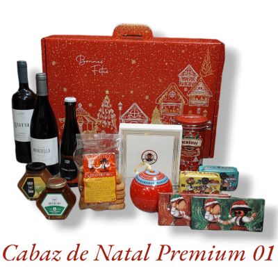 Cabaz de Natal premium com vários produtos alimentares e decorativos em caixa vermelha festiva