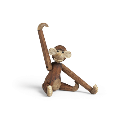Boneco de macaco de madeira com membros móveis sentado
