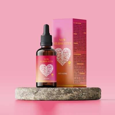 Frasco e caixa para produto cosmético em fundo rosa