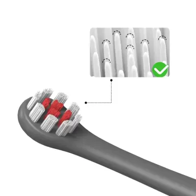 cabeça de escova de dentes elétrica cinza com cerdas brancas e vermelhas