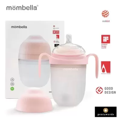 Mamadeira translúcida com tampa e pega rosa da Mômbella, caixa branca com logotipo e prémios de design