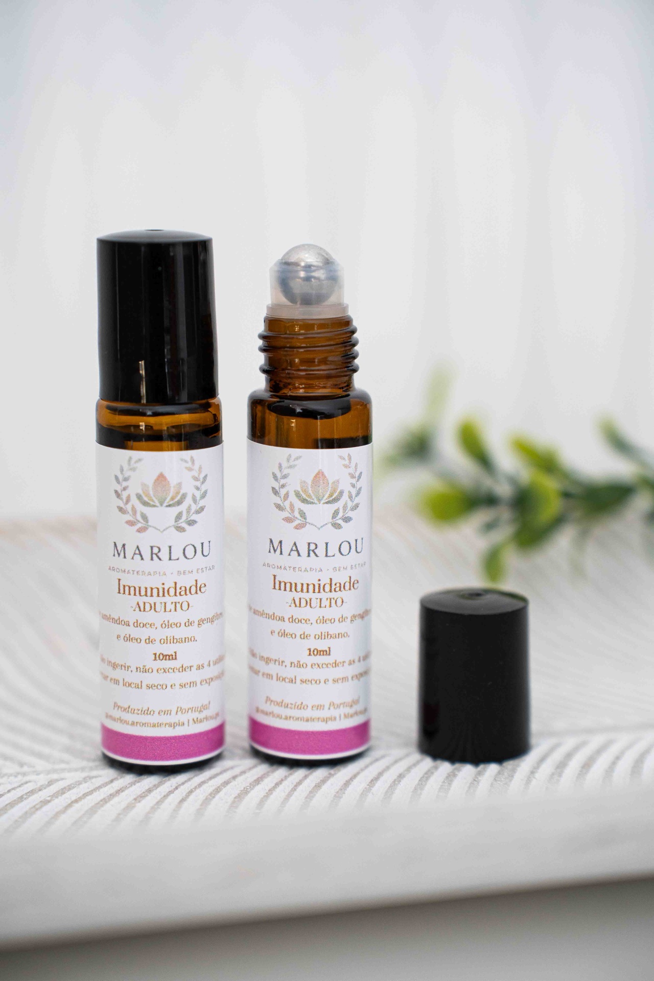 Roll on Imunidade Garrafa roll-on de vidro castanho e tampa preta com rótulo branco contendo óleo aromático MARLOU Imunidade ADULTO