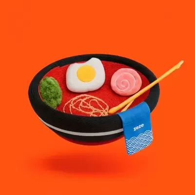 Valor decorativo de tigela com fios coloridos simulando comida, pauzinhos e etiqueta 'zeze' sobre fundo laranja