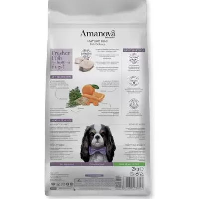 Saco de ração Amanova Mature Mini Fish Therapy para cães com imagem de peixe, legumes e cão com laço roxo.