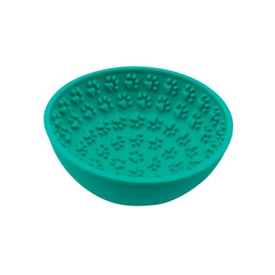 Taça verde água para animais com padrão de patas em relevo no interior.