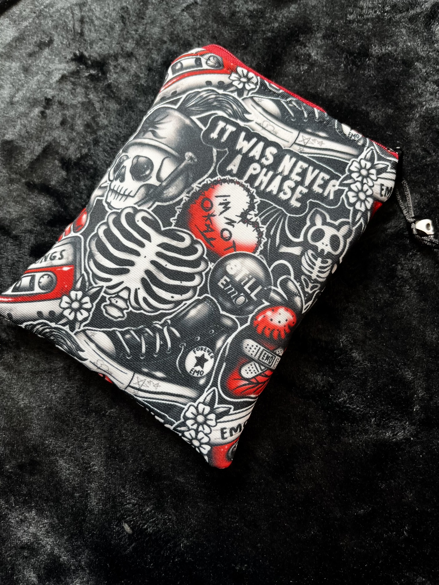 It Was Never a Phase E-Reader Zippered pouch with black, white, and red skeleton and heart graphics and text