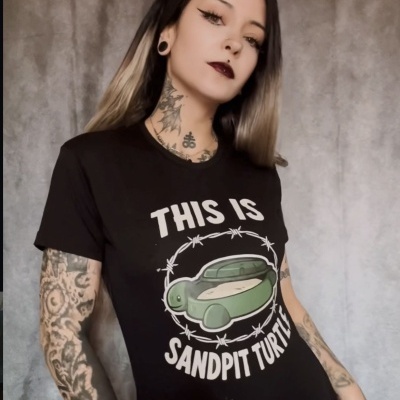 Black T-shirt with THIS IS SANDPIT TURTLE text and green turtle cartoon