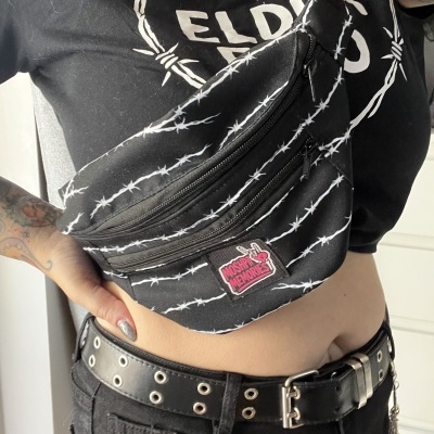 Black waist bag with barbed wire pattern and MOSHPIT MEMORIES patch