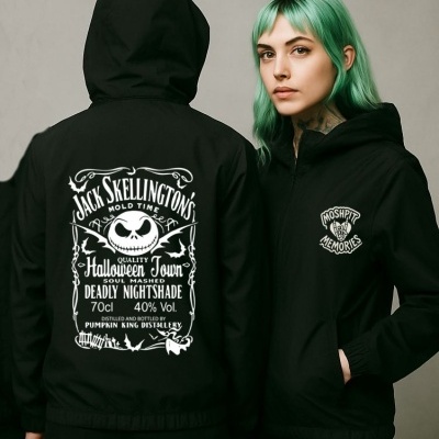 Two black hooded jackets with white Halloween-themed prints, one reading Jack Skellingtons Mold Time and the other Moshpit Memories.