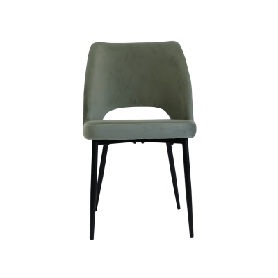 Cadeira verde aveludada com pernas pretas