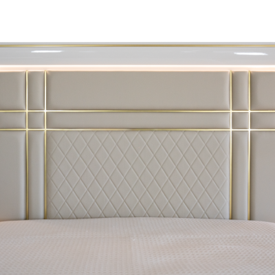 Cabeceira de cama estofada cinzenta com linhas douradas e iluminação LED branca