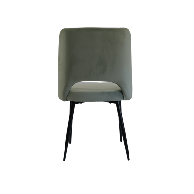 Cadeira verde de tecido com pernas pretas vista de costas