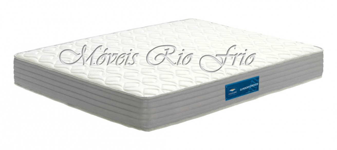 Colchão branco com padrão acolchoado e etiqueta azul