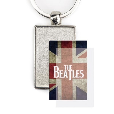 Porta-chaves com placa destacável com bandeira do Reino Unido e texto THE BEATLES