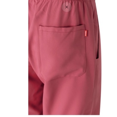 Calças rosa com bolso traseiro grande e etiqueta vermelha 'supreme'.