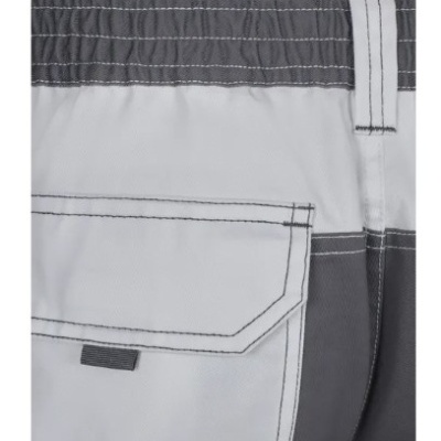 Parte traseira de calças bicolor com cintura elástica e bolso com aba