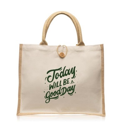 Saco de tecido bege com texto verde 'Today WILL BE A Good Day' e alças castanhas.