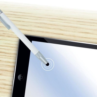 Tablet preto com ecrã branco e caneta branca sobre mesa de madeira