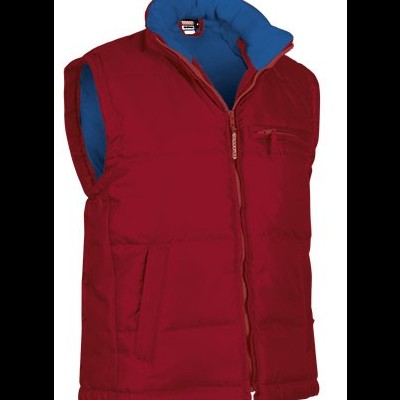 Colete acolchoado reversível vermelho e azul com fecho de correr e bolsos.