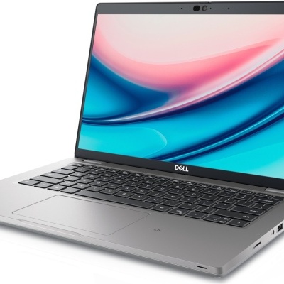 Computador portátil Dell prata aberto com ecrã colorido e teclado preto