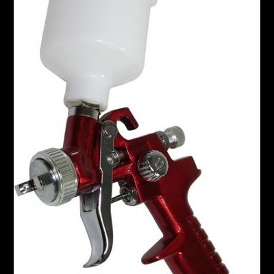 Pistola de pintura vermelha com depósito branco