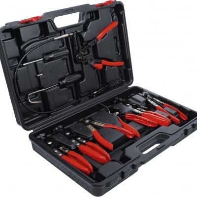 Conjunto de ferramentas manuais com cabos vermelhos em estojo preto aberto