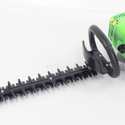 Tesouras de cerca de gasolina verdes e pretas com lâmina longa
