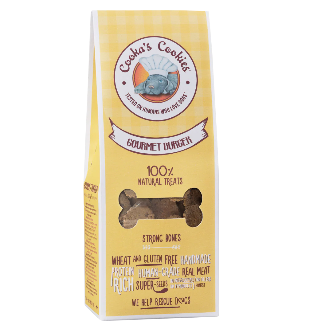 Embalagem amarela de biscoitos para cães com texto e janela em forma de osso mostrando biscoitos.