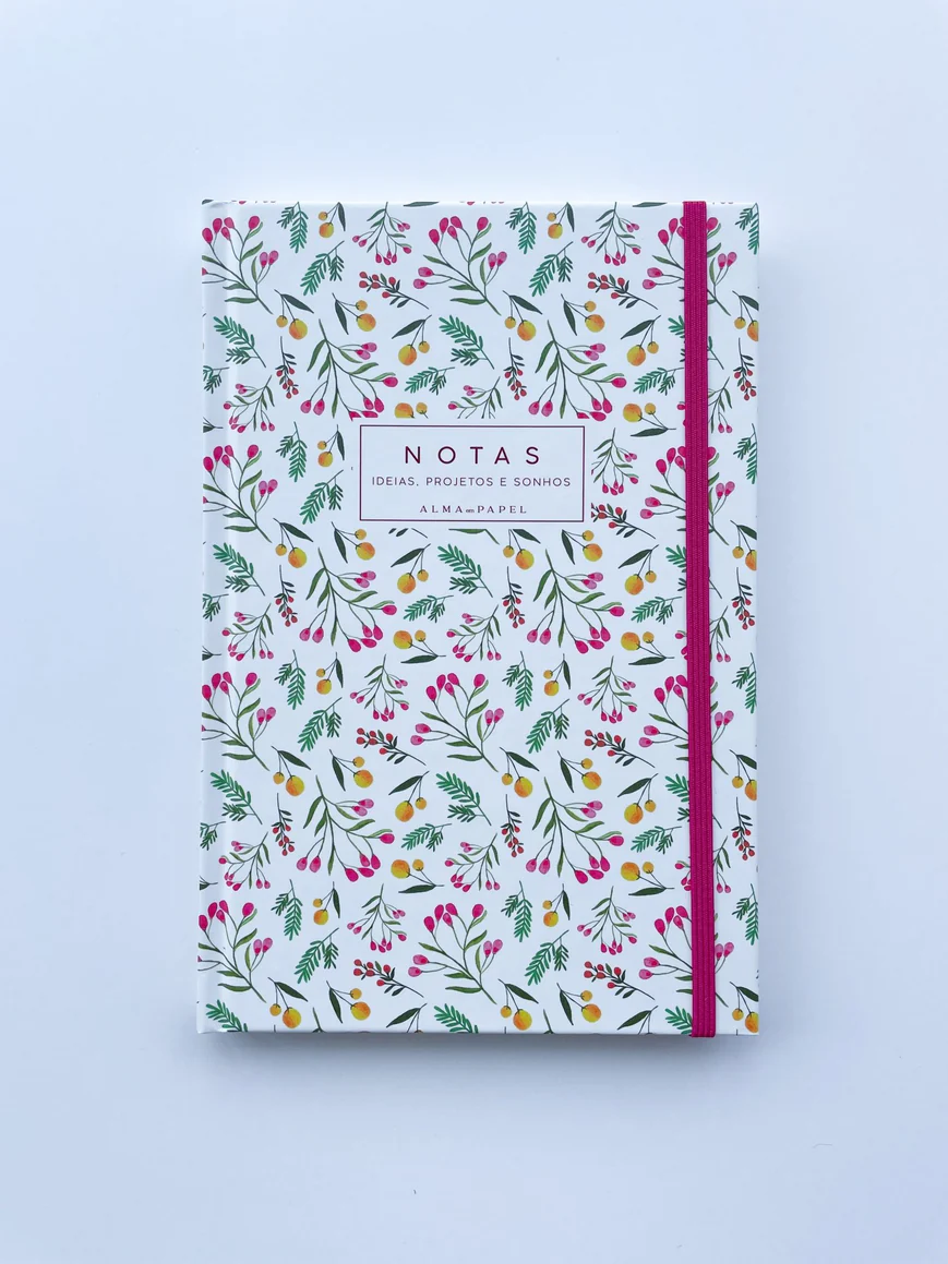 Caderno com capa branca floral e elástico rosa