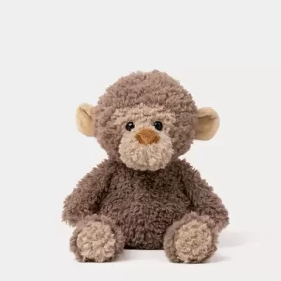 Peluche de macaco castanho sentado